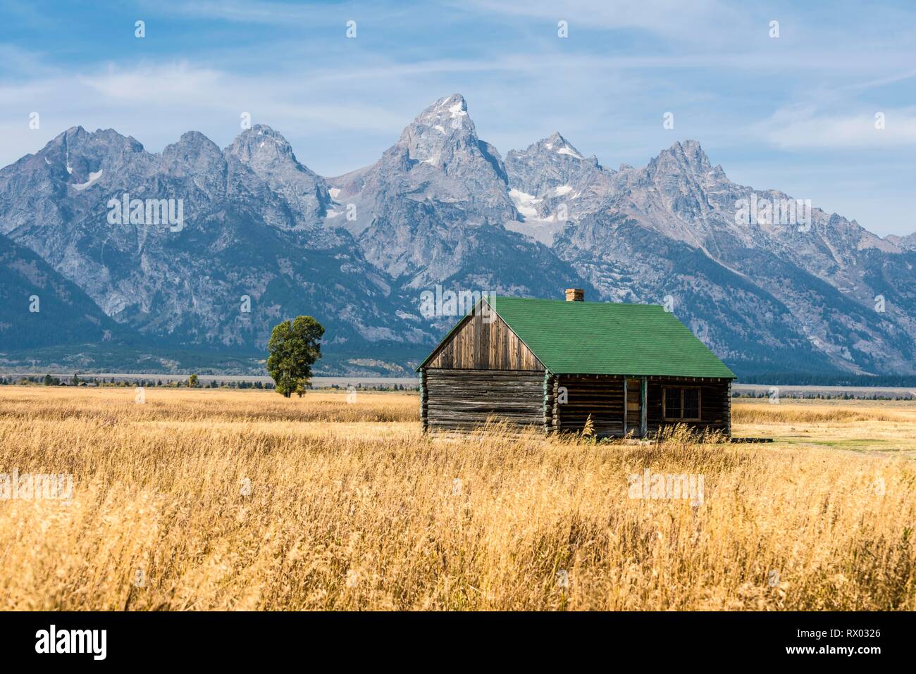 Old barn in front of the Teton Range mountain range, Mormon Row Historic District, Grand Teton National Park, Wyoming, USA Stock Photo