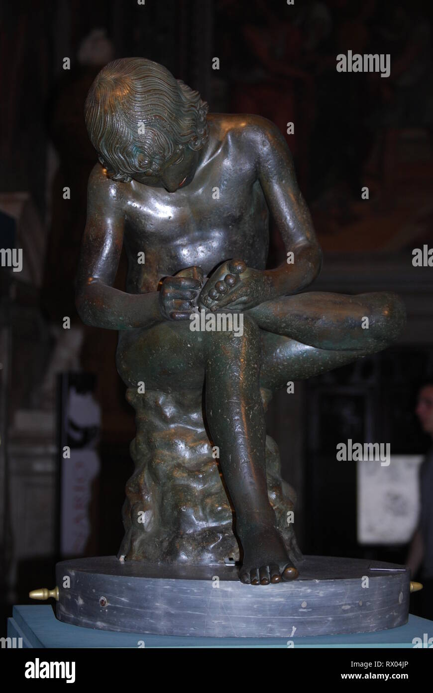 boy with thorn, also called Fedele (Fedelino) or Spinario, roman bronze statue in Palazzo dei Conservatori, Capitoline museum Stock Photo