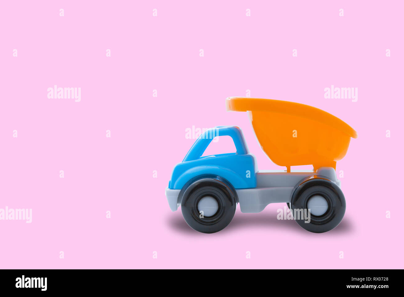 Toy Truck On A Pink Background Close Up Concept Of Building Work Or Child S Play Stock Photo Alamy Toy Truck On A Pink Background Close Up Concept Of Building Work Or Child S Play Stock Photo Alamy