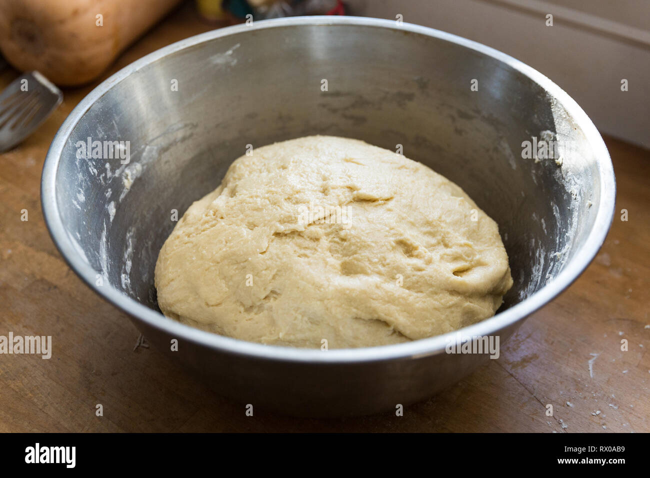 Handmade bread dough rising in a stainless steel bowl Stock Photo - Alamy
