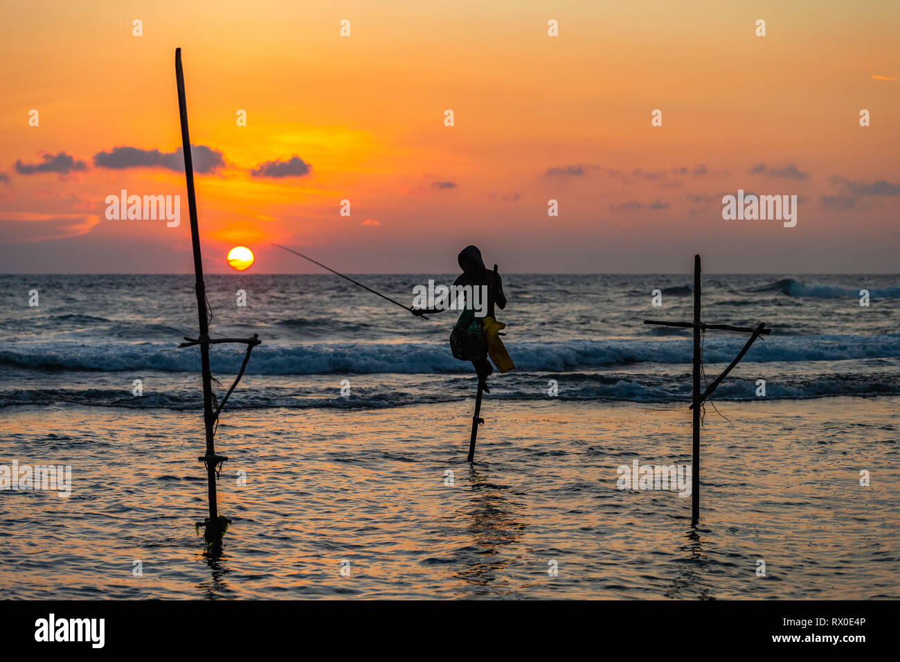 Famous traditional Sri Lankan stilt fishing. Unawatuna, Sri Lanka Stock ...