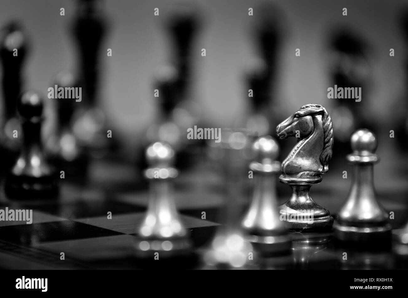 Pieces on chess board for playing game and strategy Stock Photo
