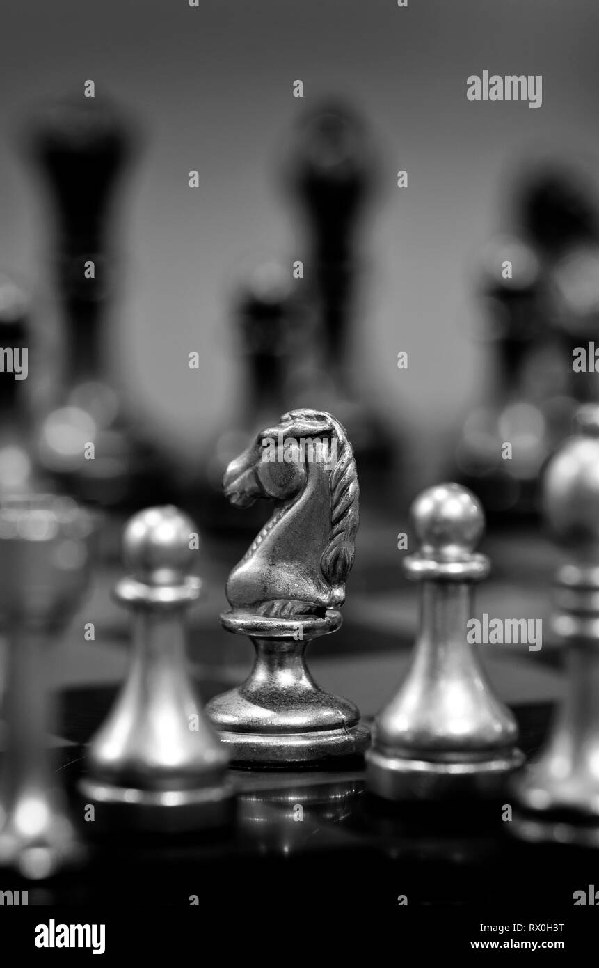 Pieces on chess board for playing game and strategy Stock Photo