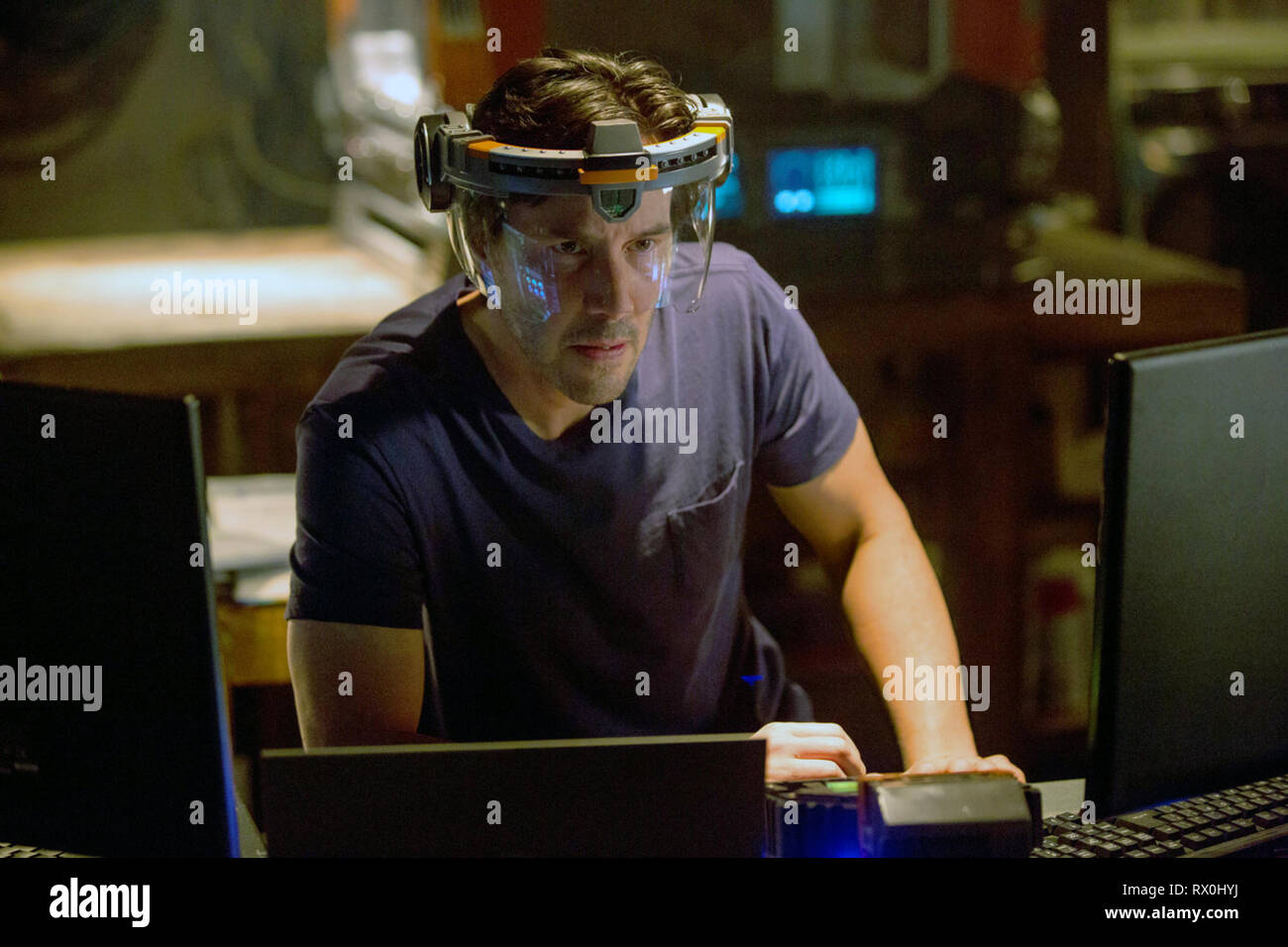 Replicas is a 2018 American science fiction thriller film directed by Jeffrey Nachmanoff, and written by Chad St. John, from a story by Stephen Hamel. The film tells the story of a neuroscientist who violates the law and biomedical ethics to bring his family members back to life after they die in a car accident. It stars Keanu Reeves, Alice Eve, and Thomas Middleditch.    This photograph is supplied for editorial use only and is the copyright of the film company and/or the designated photographer assigned by the film or production company. Stock Photo