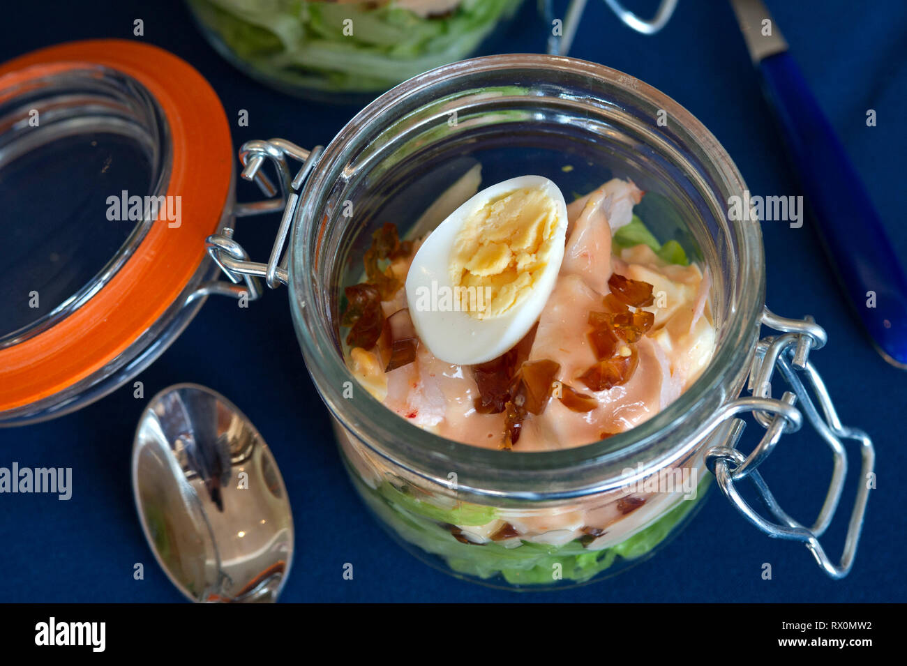 Eggs Drumkilbo or Oeuffs Drumkilbo in kilner jars, as prepared by the Nare Hotel, Cornwall, UK.  It is a dish especially favoured by the Royal Family. Stock Photo