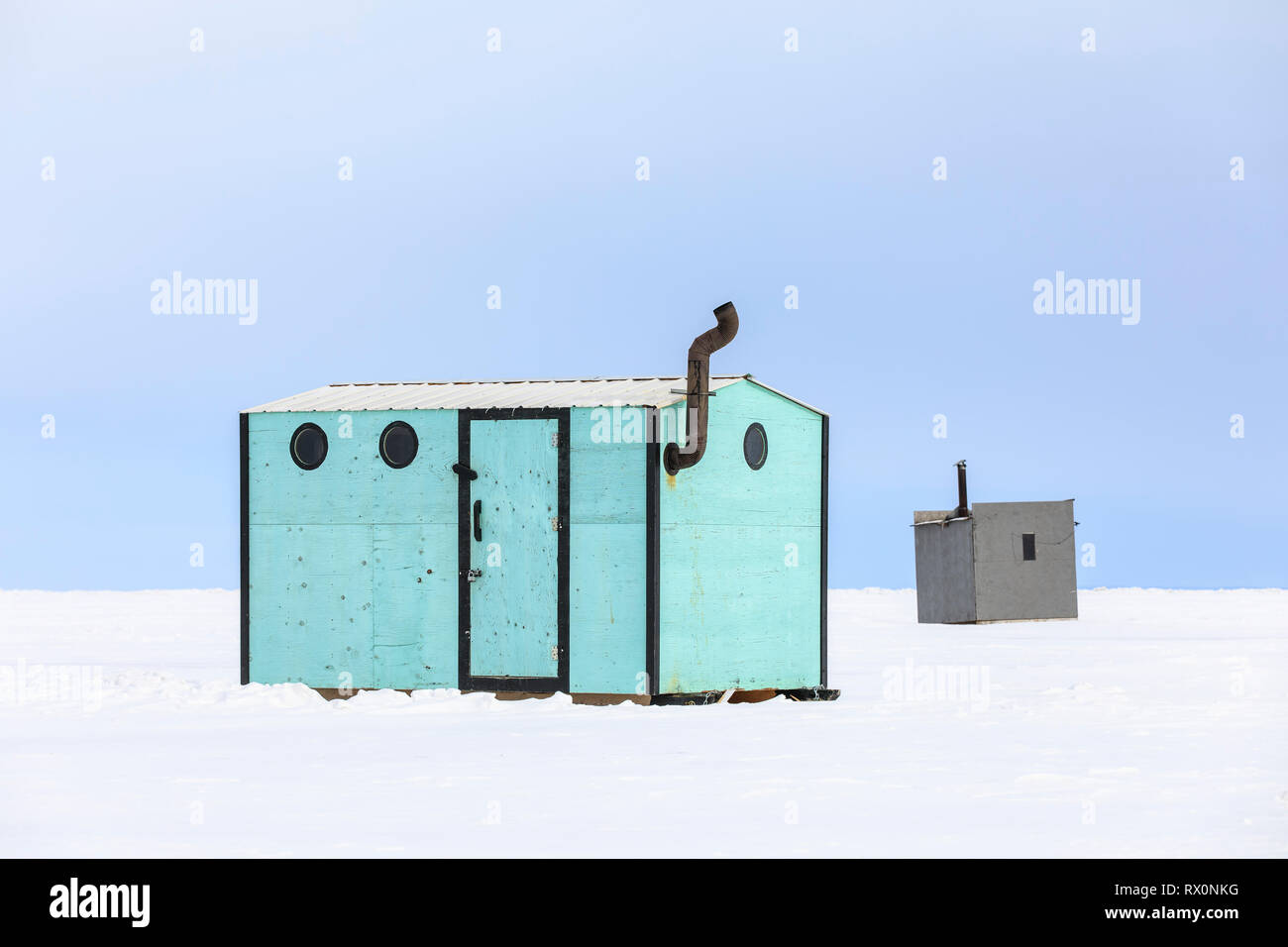 Ice fishing shacks on Lake Winnipeg, Gimli, Manitoba, Canada. Stock Photo