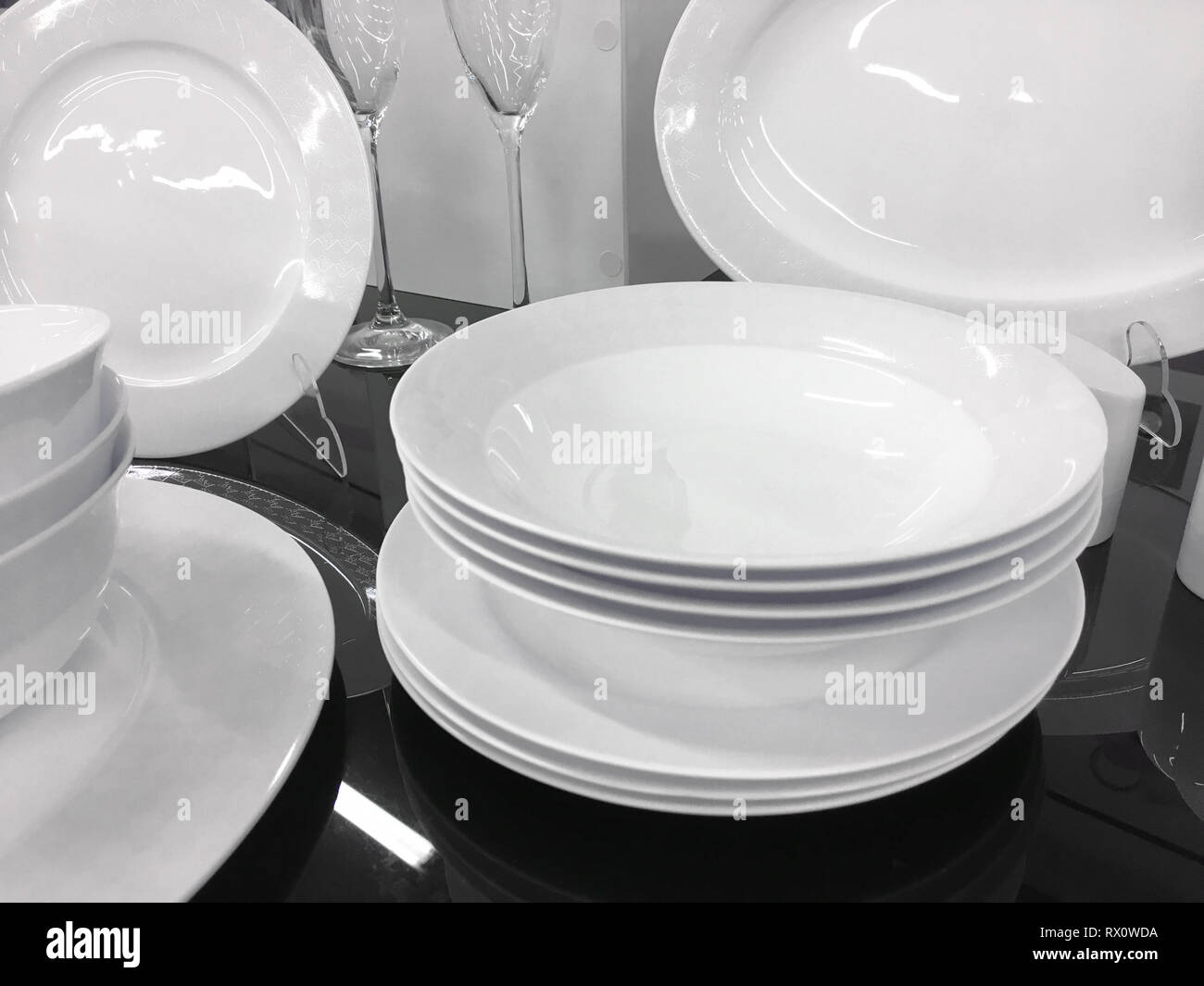 White porcelain dishes and cups stay on table Stock Photo Alamy