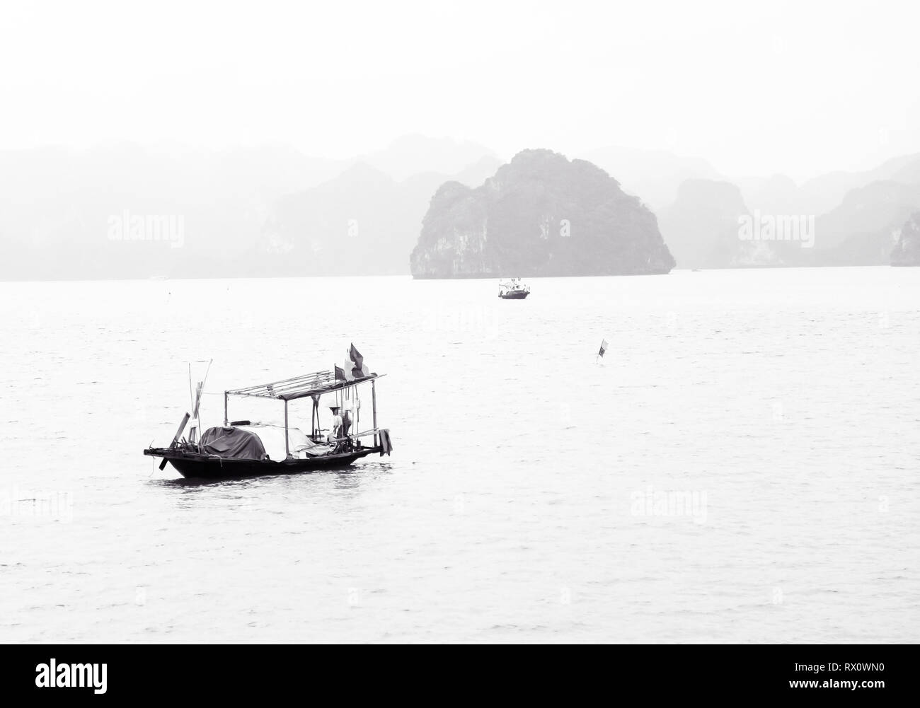 Fishermen in Halong Bay Stock Photo