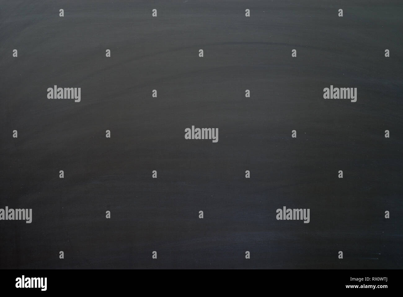 blank blackboard background with streaks from being cleaned Stock Photo