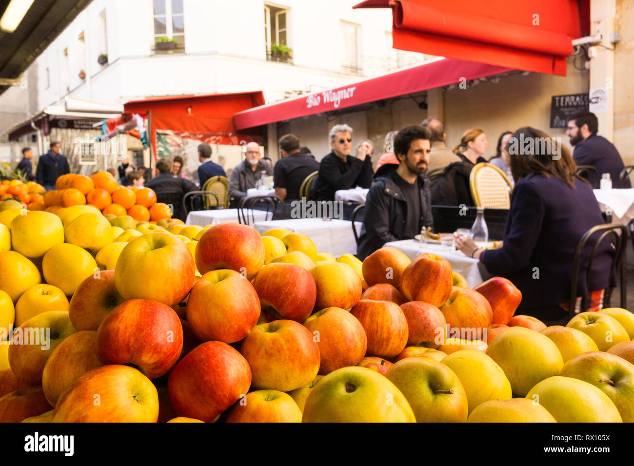 Paris food market - People having lunch break in eateries at the Marche des Enfants Rouges in the Marais district of Paris, France, Europe. Stock Photo