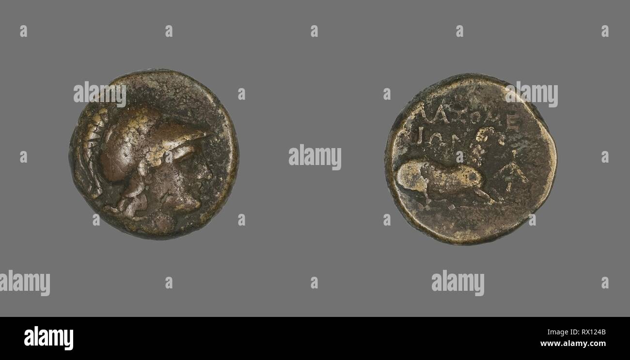 Coin Depicting the Goddess Athena. Greek. Date: 387 BC-301 BC. Dimensions: Diam. 1.7 cm; 5.78 g. Bronze. Origin: Ancient Greece. Museum: The Chicago Art Institute. Stock Photo