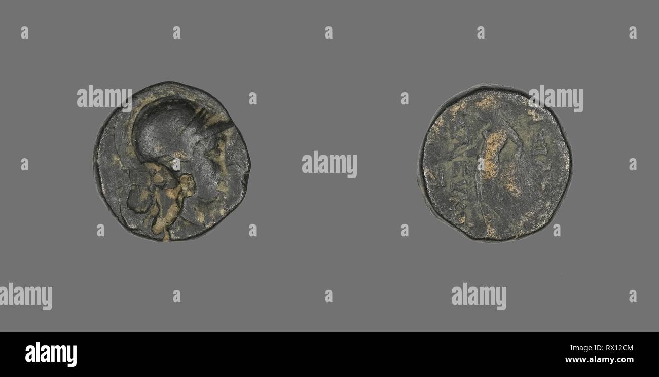 Coin Depicting the Goddess Athena. Greek. Date: 246 BC-226 BC. Dimensions: Diam. 1.5 cm; 4.54 g. Bronze. Origin: Ancient Greece. Museum: The Chicago Art Institute. Stock Photo