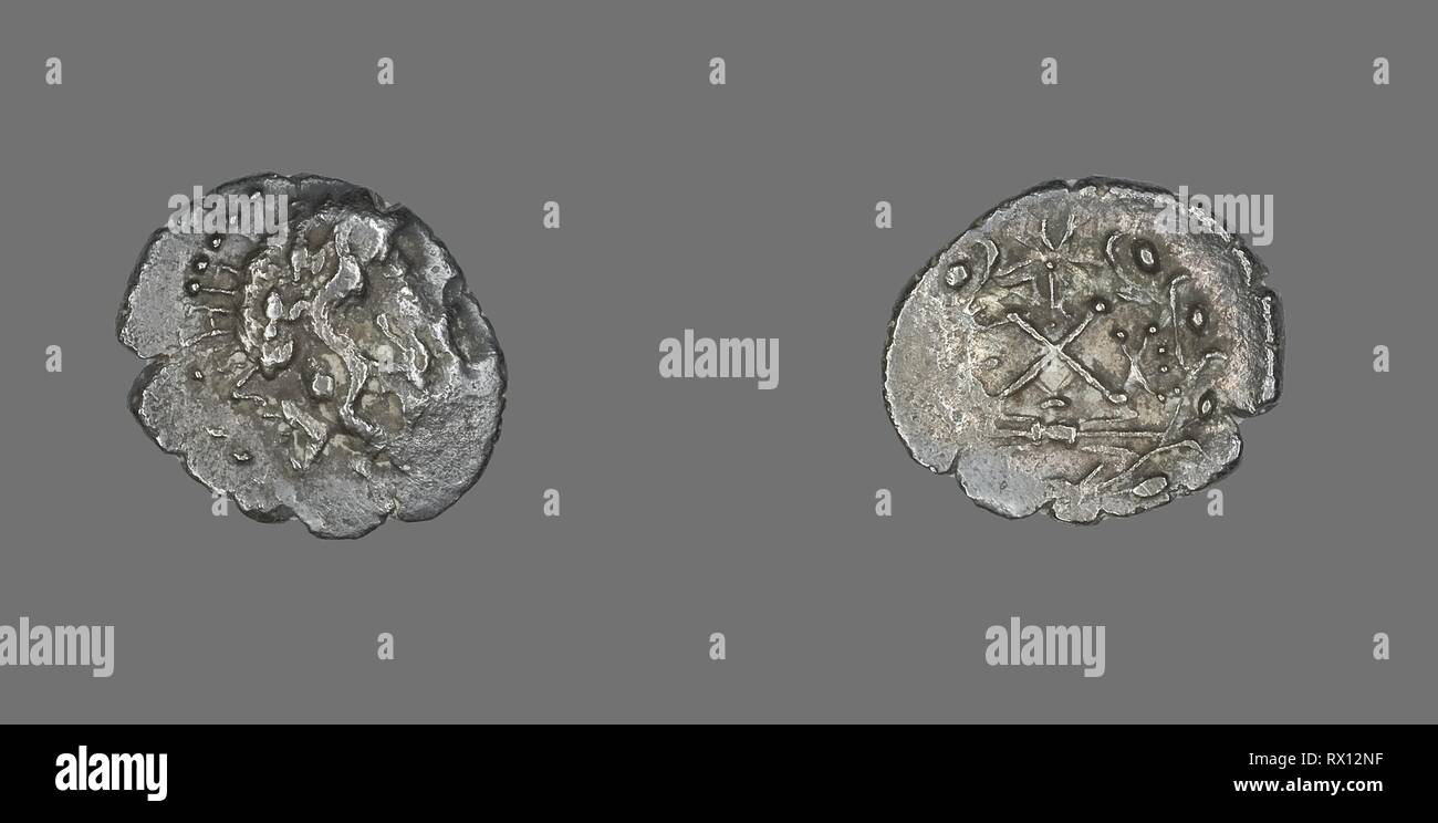 Hemidrachm (Coin) Depicting the God Zeus Amarios. Greek. Date: 191 BC-146 BC. Dimensions: Diam. 1.8 cm; 2.05 g. Silver. Origin: Ancient Greece. Museum: The Chicago Art Institute. Stock Photo