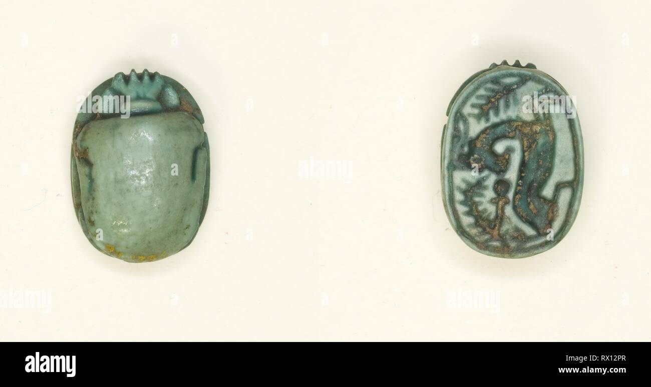 Scarab: Antelope with Foliage (sw.t-plant) Motif. Egyptian. Date: 1650 BC-1295 BC. Dimensions: 1.3 × 1 × 0.6 cm (1/2 × 3/8 × 1/4 in.). Glazed steatite. Origin: Egypt. Museum: The Chicago Art Institute. Author: Ancient Egyptian. Stock Photo