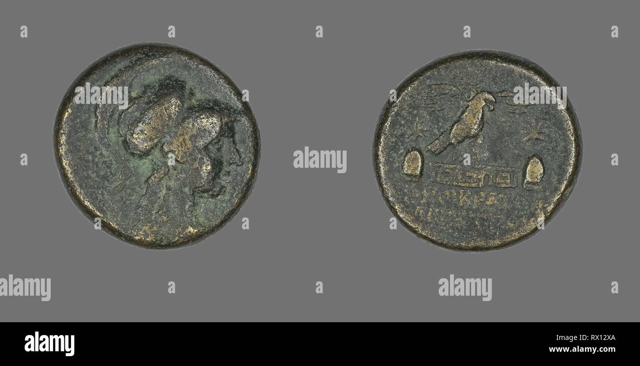Coin Depicting the Goddess Athena. Greek. Date: 133 BC-48 BC. Dimensions: Diam. 2.1 cm; 7.95 g. Bronze. Origin: Ancient Greece. Museum: The Chicago Art Institute. Stock Photo