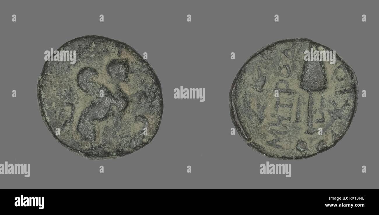 Coin Depicting Sphinx. Greek. Date: 84 BC. Dimensions: Diam. 1.3 cm; 1.91 g. Bronze. Origin: Ancient Greece. Museum: The Chicago Art Institute. Stock Photo