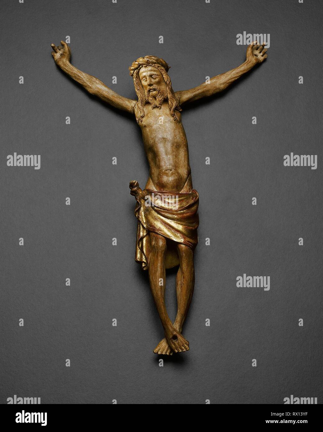 Corpus of Christ, from the Altarpiece of the Crucifixion. Jacques de Baerze; Netherlandish, active before 1384-1399; Melchior Broederlam; Netherlandish, about 1355-about 1411. Date: 1391-1399. Dimensions: 27.7 × 18.3 × 5.2 cm (11 × 6 1/4 × 2 1/16 in.). Walnut with gilding and traces of polychromy. Origin: Flanders. Museum: The Chicago Art Institute. Stock Photo