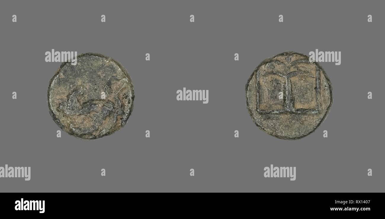 Coin Depicting Pegasus. Greek. Date: 400 BC-310 BC. Dimensions: Diam. 0.9 cm; 0.77 g. Bronze. Origin: Ancient Greece. Museum: The Chicago Art Institute. Stock Photo