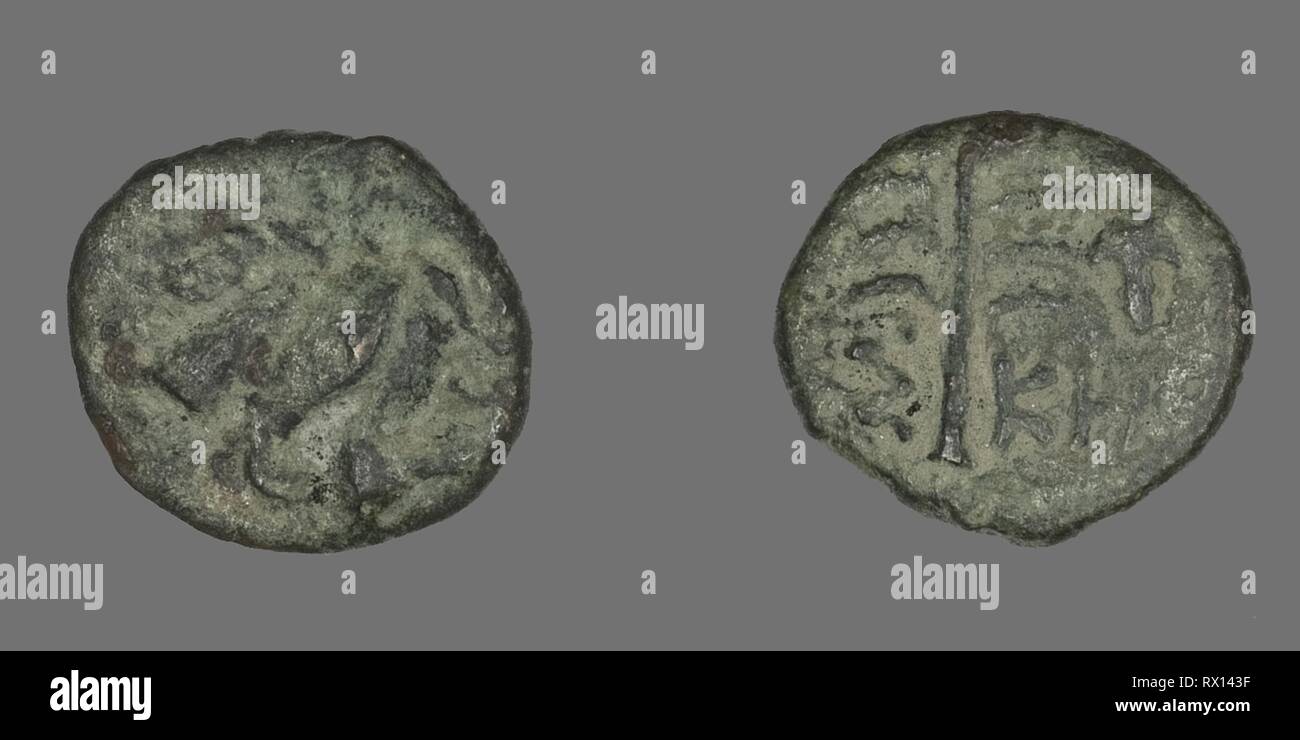 Coin Depicting Pegasus. Greek. Date: 400 BC-201 BC. Dimensions: Diam. 1.4 cm; 1.37 g. Bronze. Origin: Ancient Greece. Museum: The Chicago Art Institute. Stock Photo