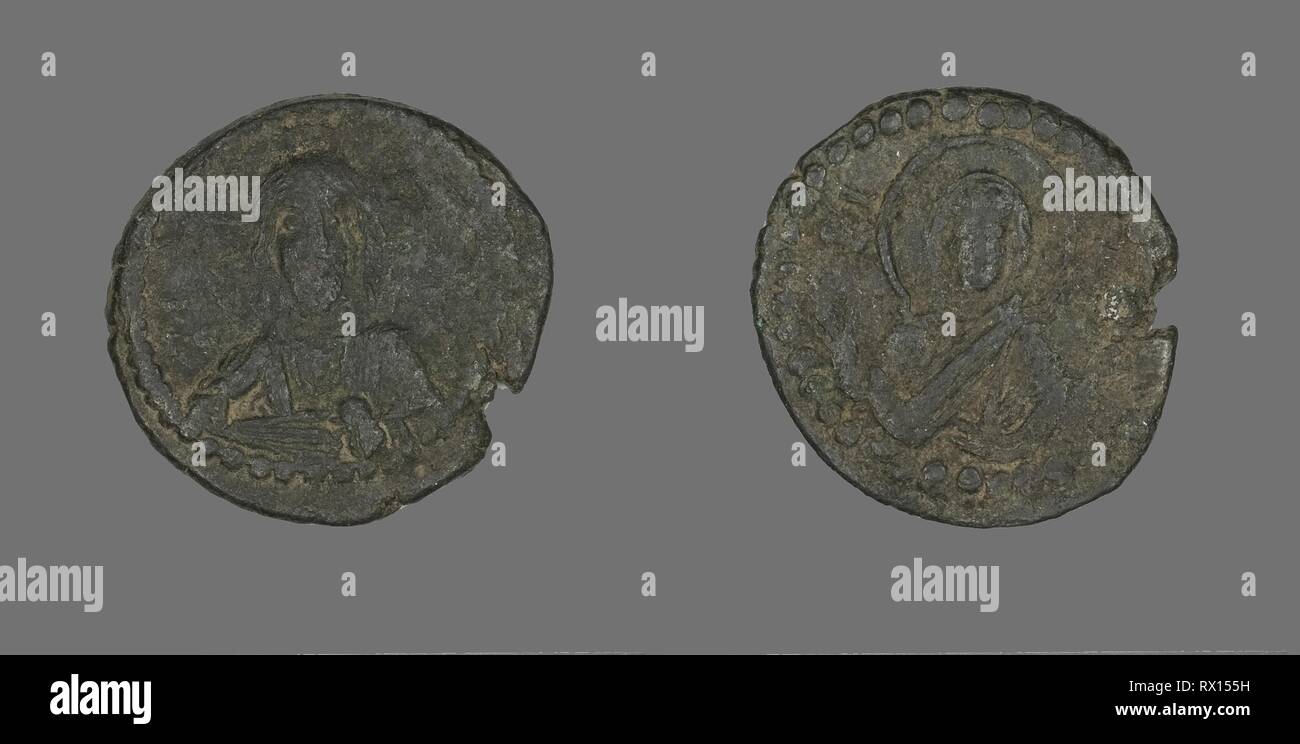 Anonymous Follis (Coin), Attributed to Constantine IX. Byzantine. Date: 1042-1055. Dimensions: Diam. 2.8 cm; 7.05 g. Bronze. Origin: Greece. Museum: The Chicago Art Institute. Stock Photo