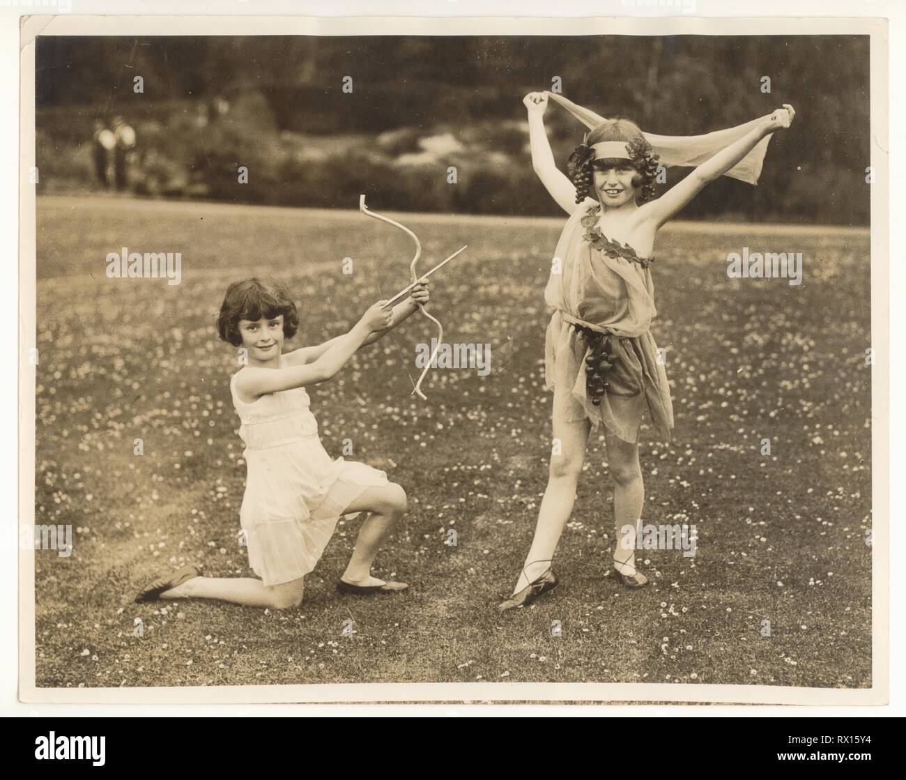 1920's photograph of Lady Acland's daughters, Molly (LH), Betty (RH) by Billie Bristow, choreography by Dorice Stainer, Leslie Howard's sister, outside in garden, London, U.K. circa 1928 Stock Photo