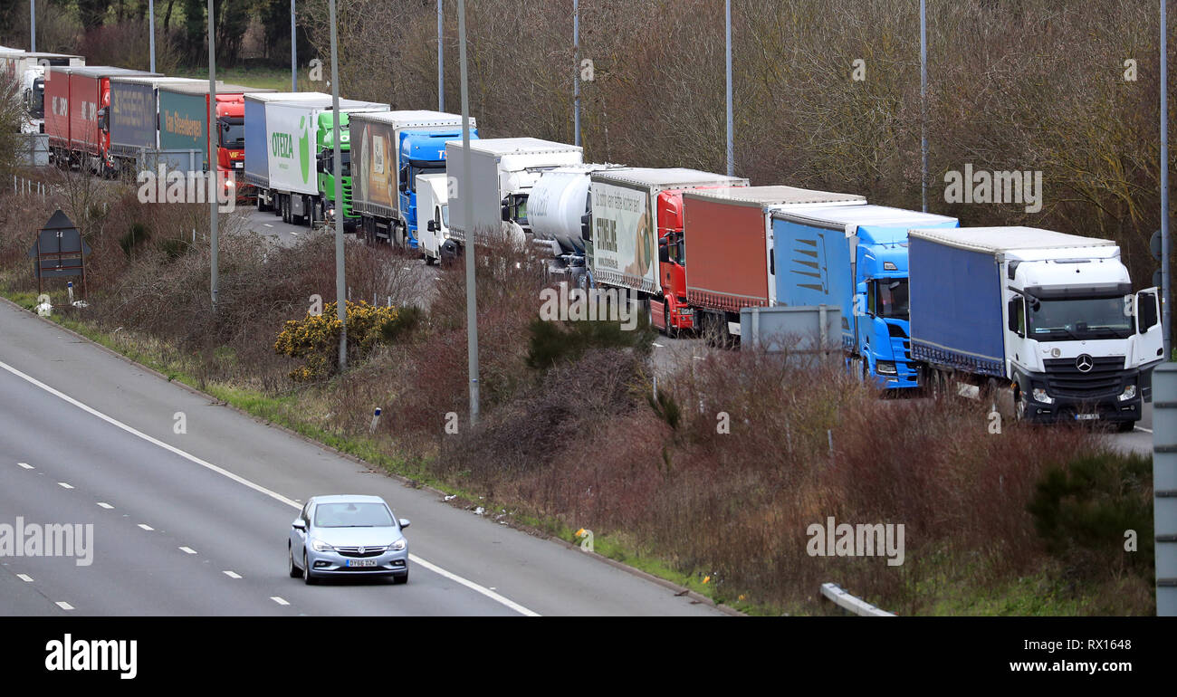 Lorries queue to enter the Eurotunnel site in Folkestone, Kent, as industrial action in France continues. Stock Photo
