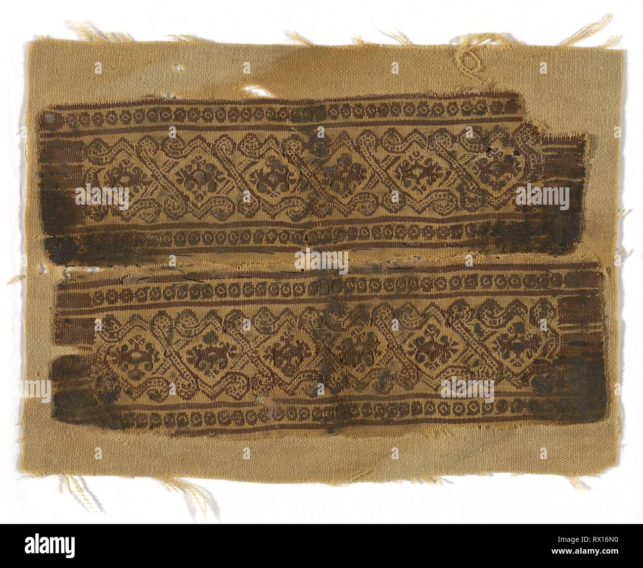 Pair of Cuff Bands. Coptic; Egypt. Date: 201 AD-500 AD. Dimensions: 7 × 23 cm (2 3/4 × 9 in.)  7.5 × 23.3 cm (3 × 9 1/8 in.). Wool, tapestry weave. Origin: Egypt. Museum: The Chicago Art Institute. Stock Photo