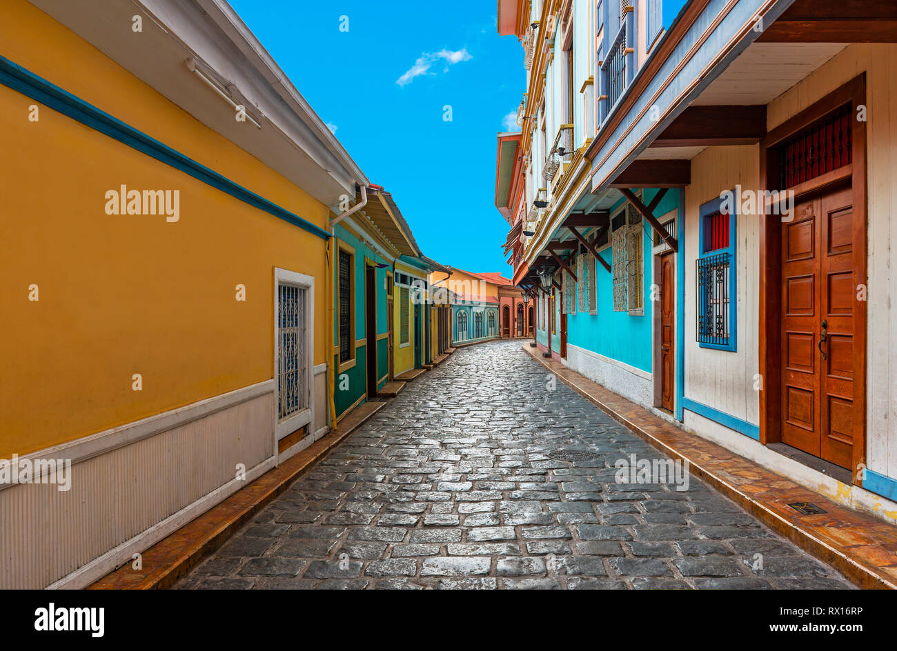 Cityscape of a colourful street of Guayaquil, famous of cobblestones and wooden colonial architecture, Las Penas district on Santa Ana Hill, Ecuador. Stock Photo