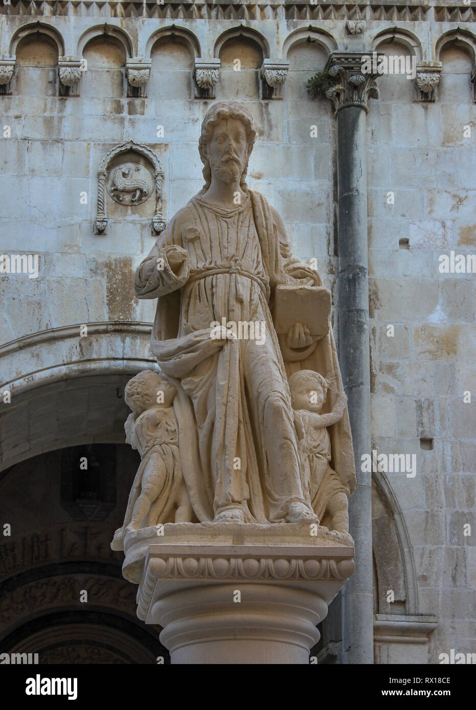 Statue of St Lawrence in front of the entrance to the Cathedral, Trogir, Dalmatia, Croatia Stock Photo