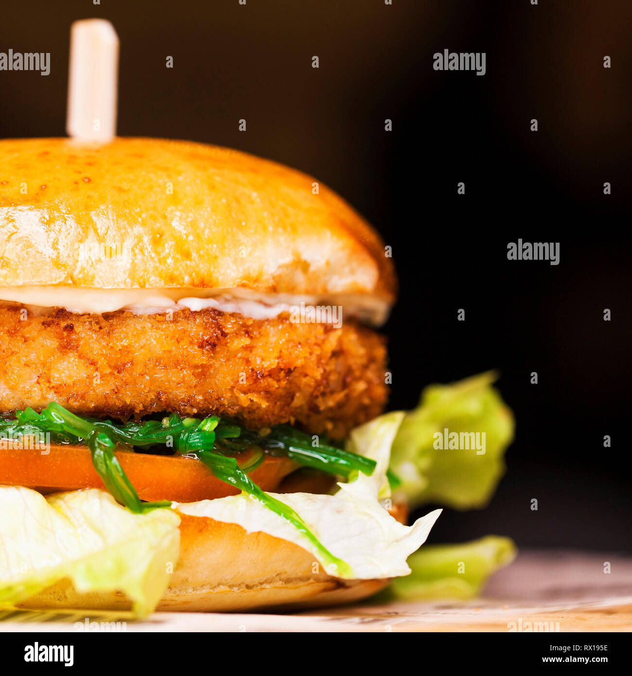 Fast food closeup with traditional tasty hamburger Stock Photo Alamy