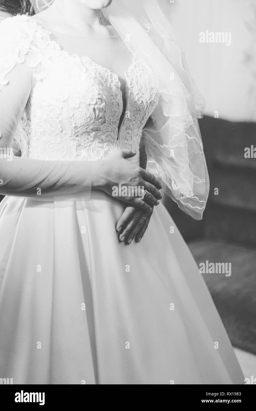 Beautiful hands of a young bride in a wedding dress Stock Photo - Alamy