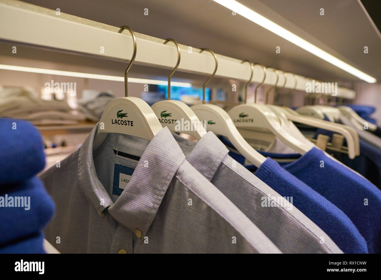 DUSSELDORF, GERMANY - CIRCA SEPTEMBER, 2018: Lacoste sign on clothes hanger  at Lacoste shop in Dusseldorf Stock Photo - Alamy