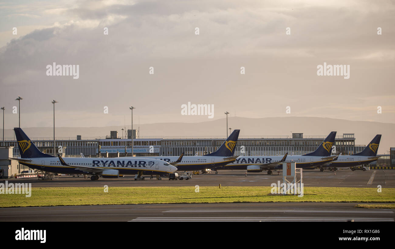 Prestwick, UK. 7 March 2019. Ryanair planes seen at Prestwick on a Spring evening.  Ryanair is an Irish low-cost airline founded in 1984, headquartere Stock Photo