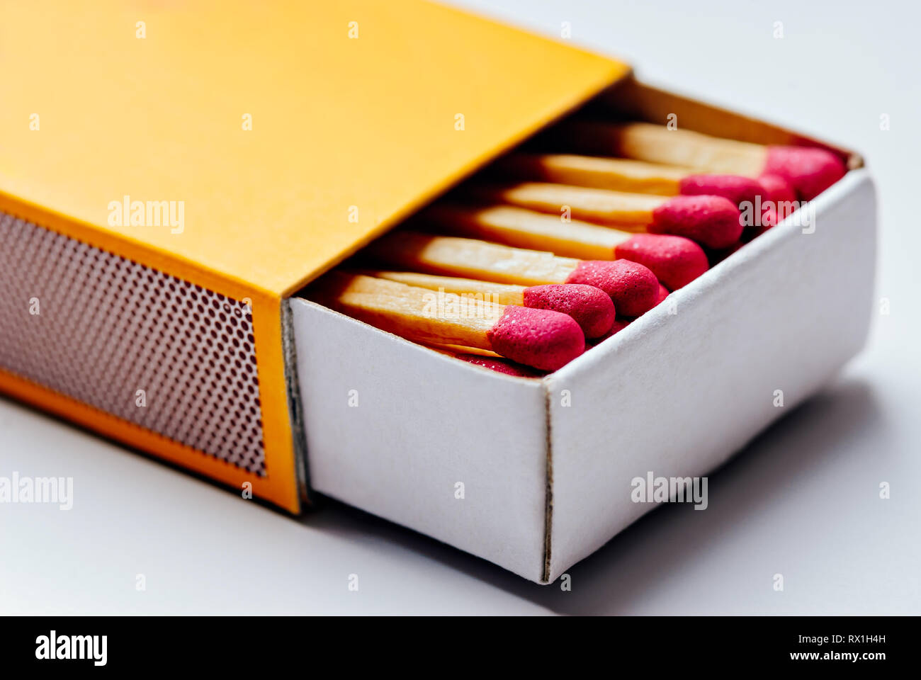 Download Brand New Open Yellow Matchbox With Many Pink Match Sticks In It Stock Photo Alamy Yellowimages Mockups