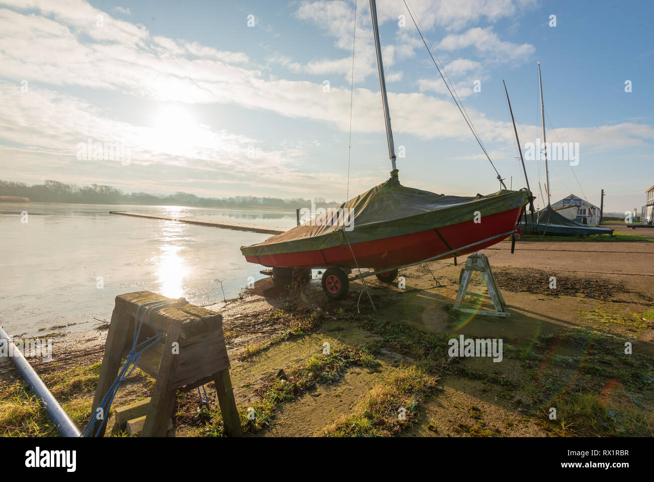 A Yacht under wraps waiting to go on the lake at Hornsea Mere Stock Photo