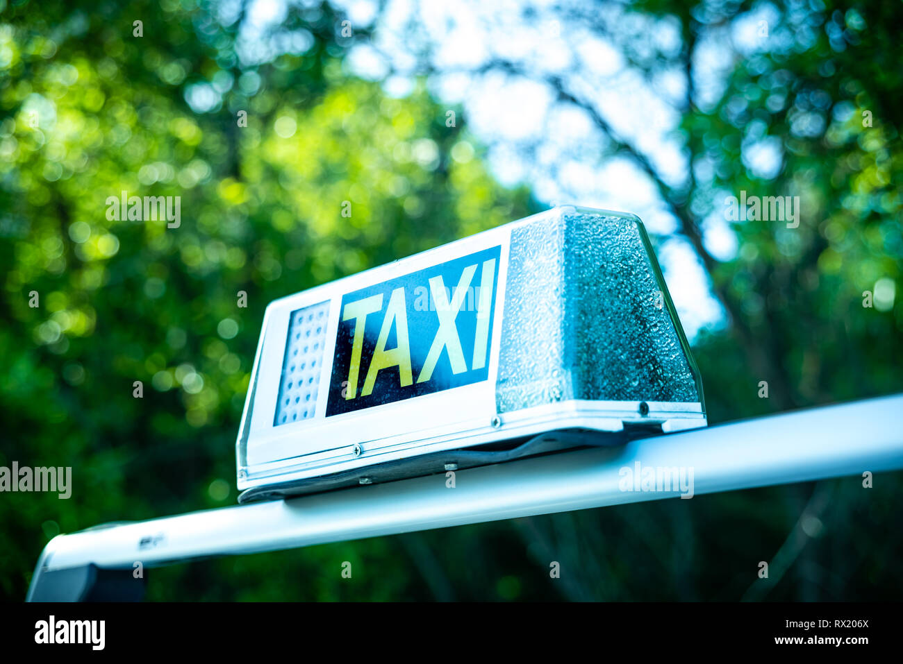 Bright Sign With The Word Taxi On A Car Stock Photo Alamy