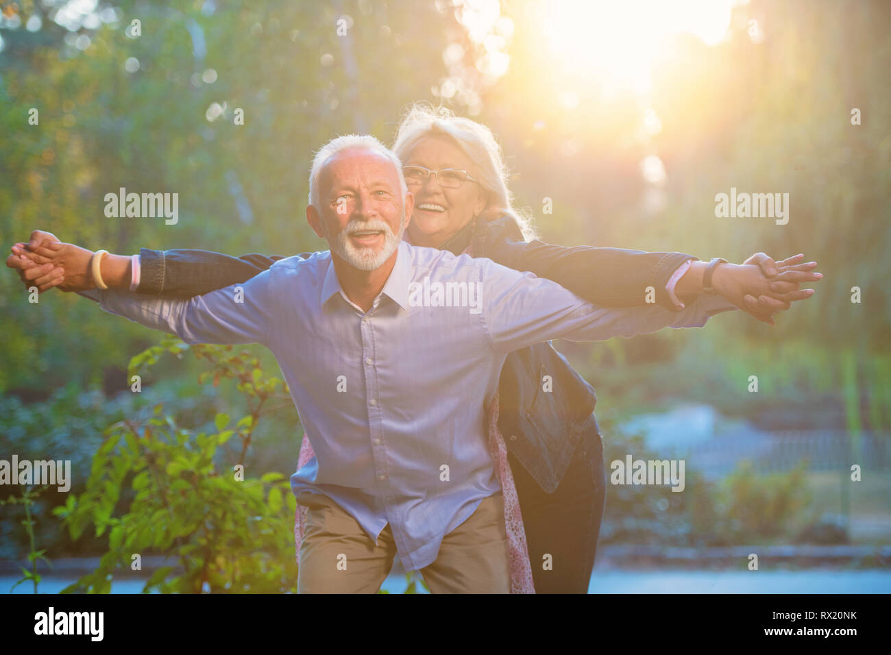 Happy senior couple in love. Park outdoors Stock Photo - Alamy