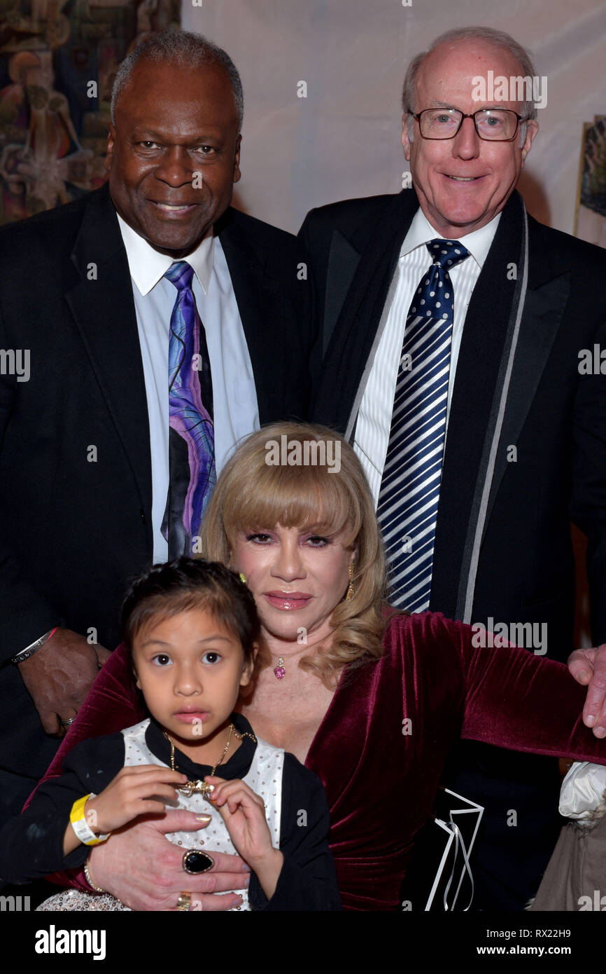BEVERLY HILLS, CA - FEBRUARY 24:  Kim Estes, Rod Sherwood, and Daphana Edwards Ziman attend the Cinémoi 2019 Oscar Party on February 24 2019 in Beverl Stock Photo
