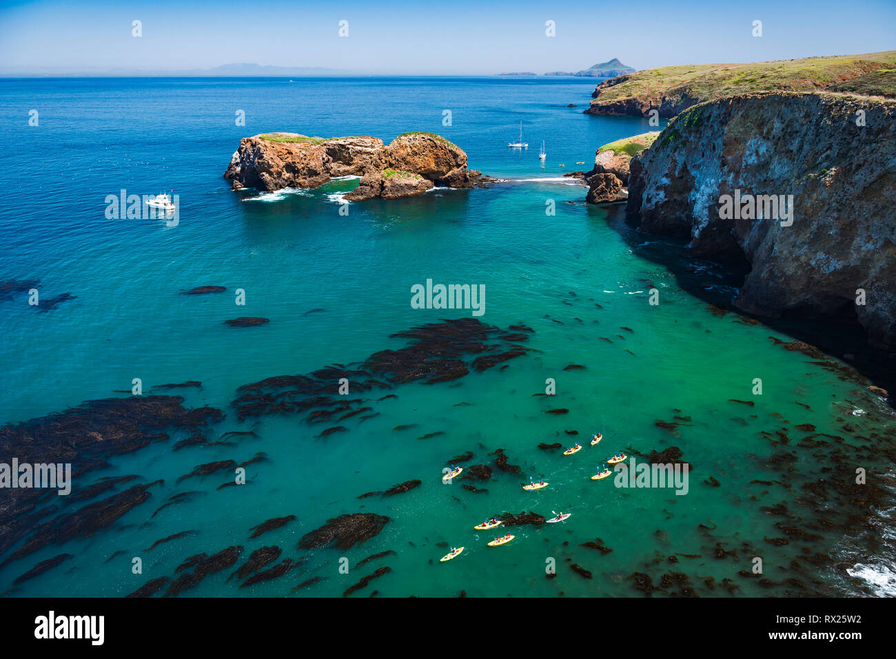 Kayaks and sailboats at Scorpion Cove, Santa Cruz Island, Channel ...