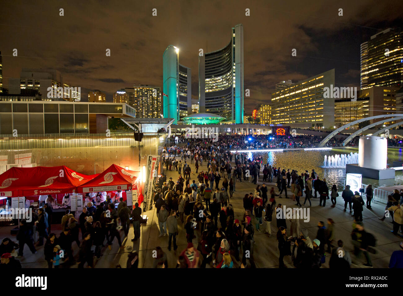 Crowds on Nathan Phillips Square in Toronto during Nuit Blanche contemporary art event Stock Photo