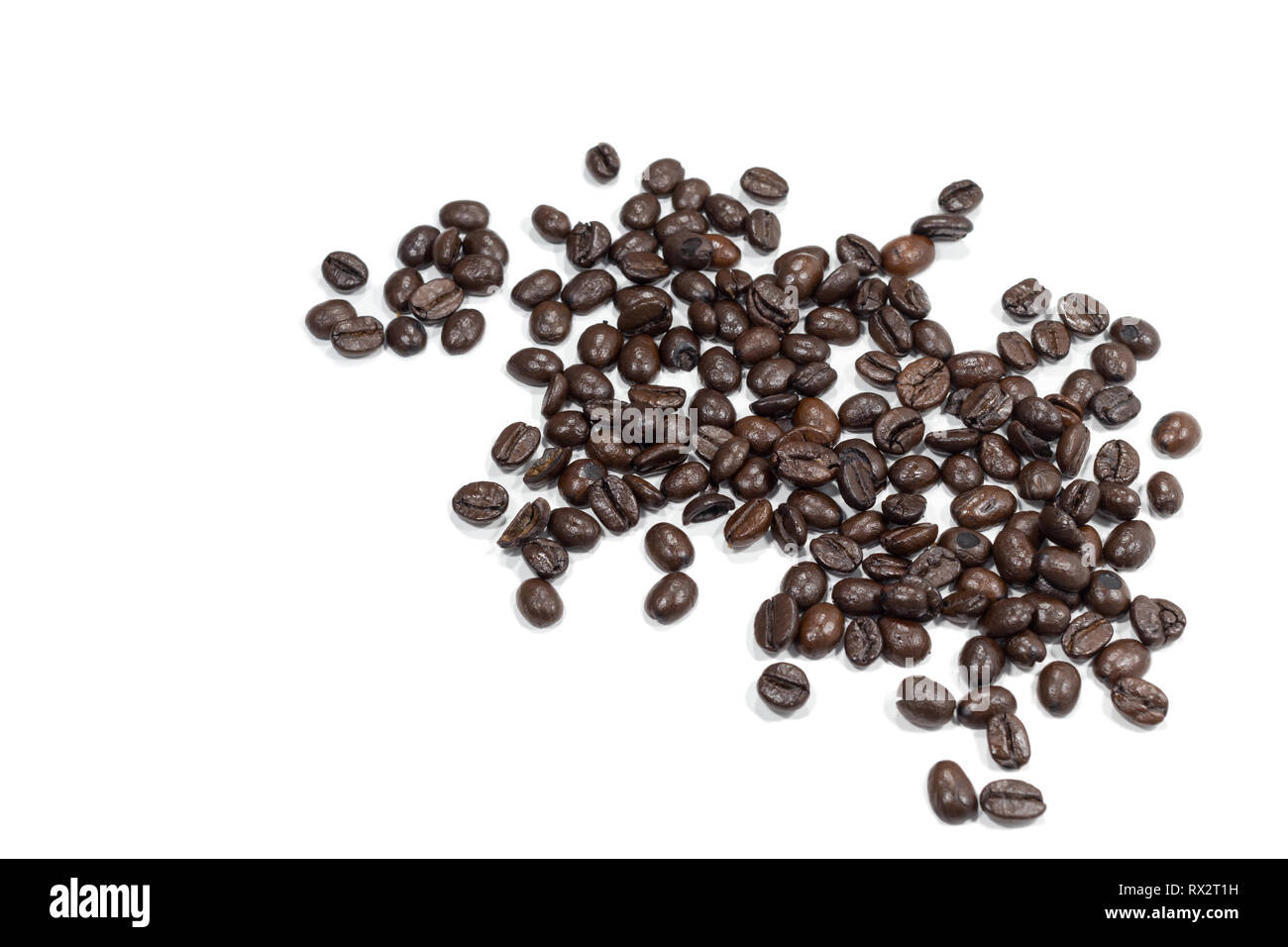 Top view Roasted coffee beans is a frame pattern isolated on white background. Stock Photo