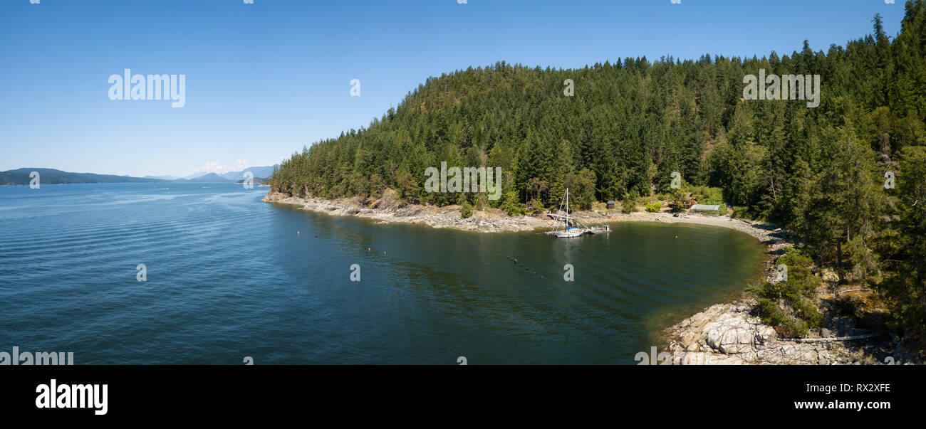 Aerial panoramic view of a rocky coast during a vibrant sunny summer day. Taken near Powell River, Sunshine Coast, British Columbia, Canada. Stock Photo