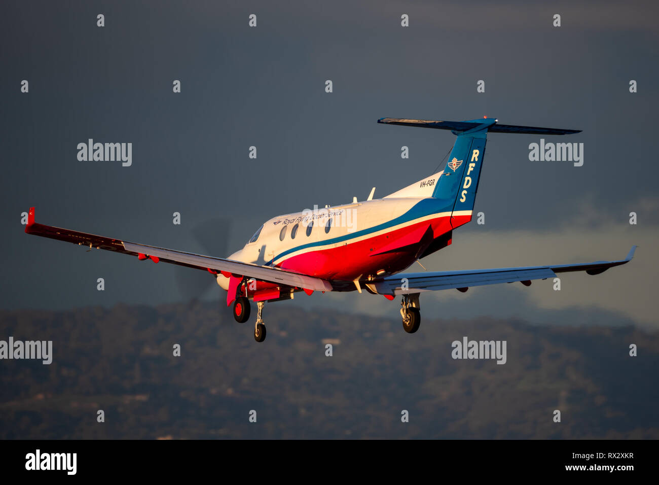 Royal Flying Doctors Service of Australia Pilatus PC-12 single engine air ambulance aircraft on approach to land at Adelaide Airport. Stock Photo