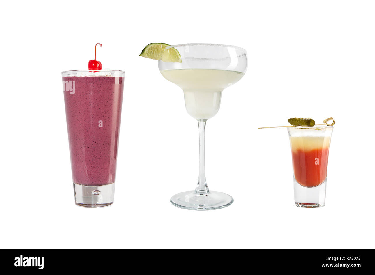 A variety of alcoholic drinks, beverages and cocktails on a white