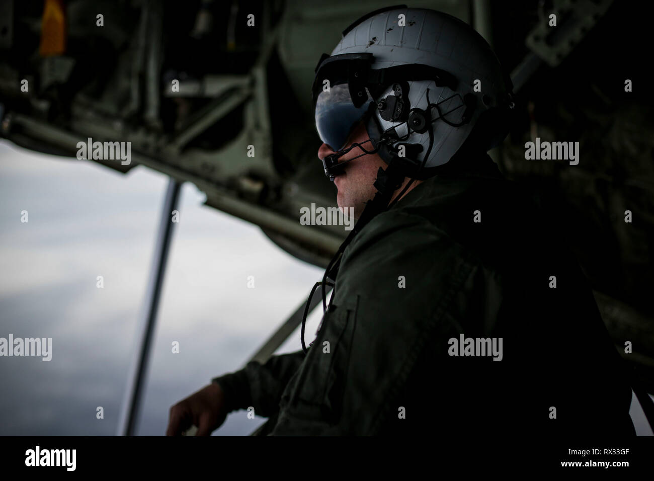 A KC-130J Hercules with Marine Aerial Refueler Transport Squadron (VMGR) 352, Marine Aircraft Group (MAG) 11, 3rd Marine Aircraft Wing (MAW), prepares to refuel an F/A-18 Hornet, over the W-291 training area in southern California, March 6. VMGR-352 enhances 3rd MAW’s ability generate lethality by increasing the range and flight time of the aircraft flying in support of a Marine Air-Ground Task Force (MAGTF). (U.S Marine Corps photo by Sgt. David Bickel) Stock Photo