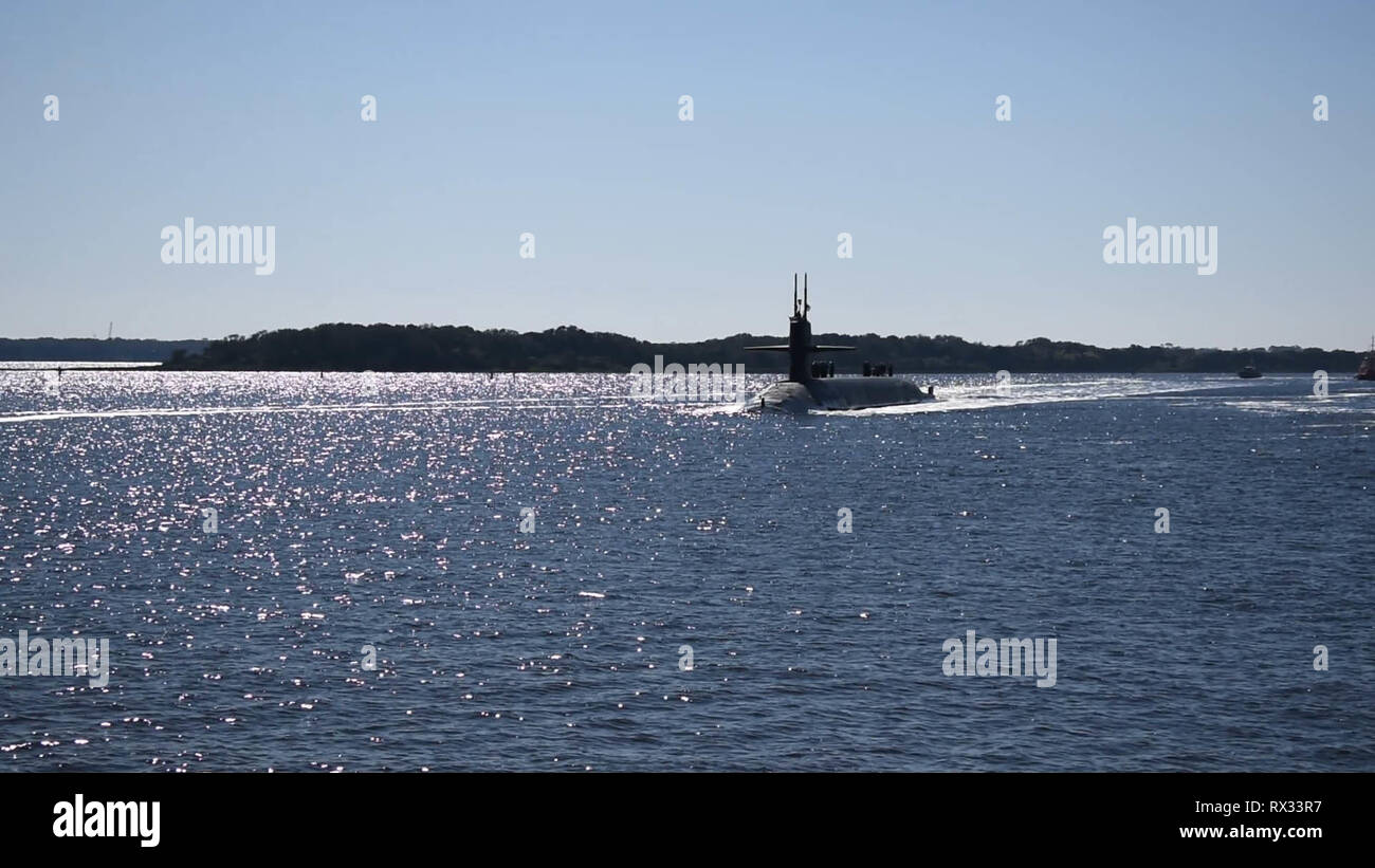 The Ohio-class ballistic-missile submarine USS Rhode Island (SSBN 740) Gold crew returns to its homeport, Naval Submarine Base Kings Bay, Ga. The boat is one of five ballistic-missile submarines stationed at the base and is capable of carrying up to 20 submarine-launched ballistic missiles with multiple warheads. (U.S. Navy photo by Mass Communication Specialist 2nd Class Bryan Tomforde) Stock Photo
