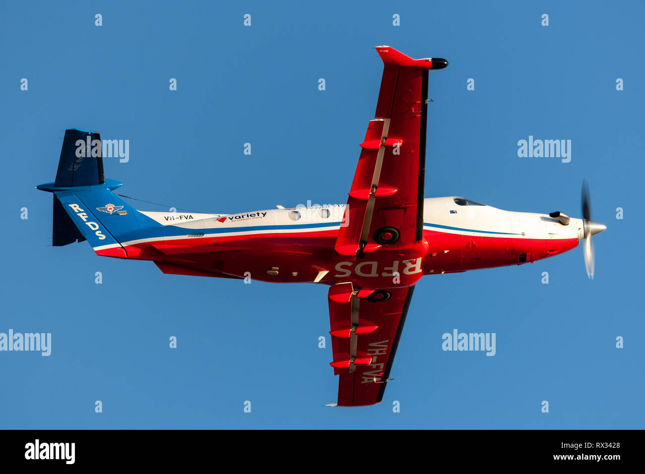Royal Flying Doctors Service of Australia Pilatus PC-12 single engine air ambulance aircraft taking off from Ad Stock Photo