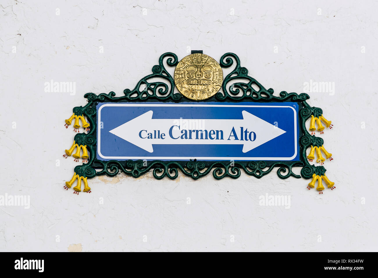 Traditional street sign decorated with Inca motifs and the national ...