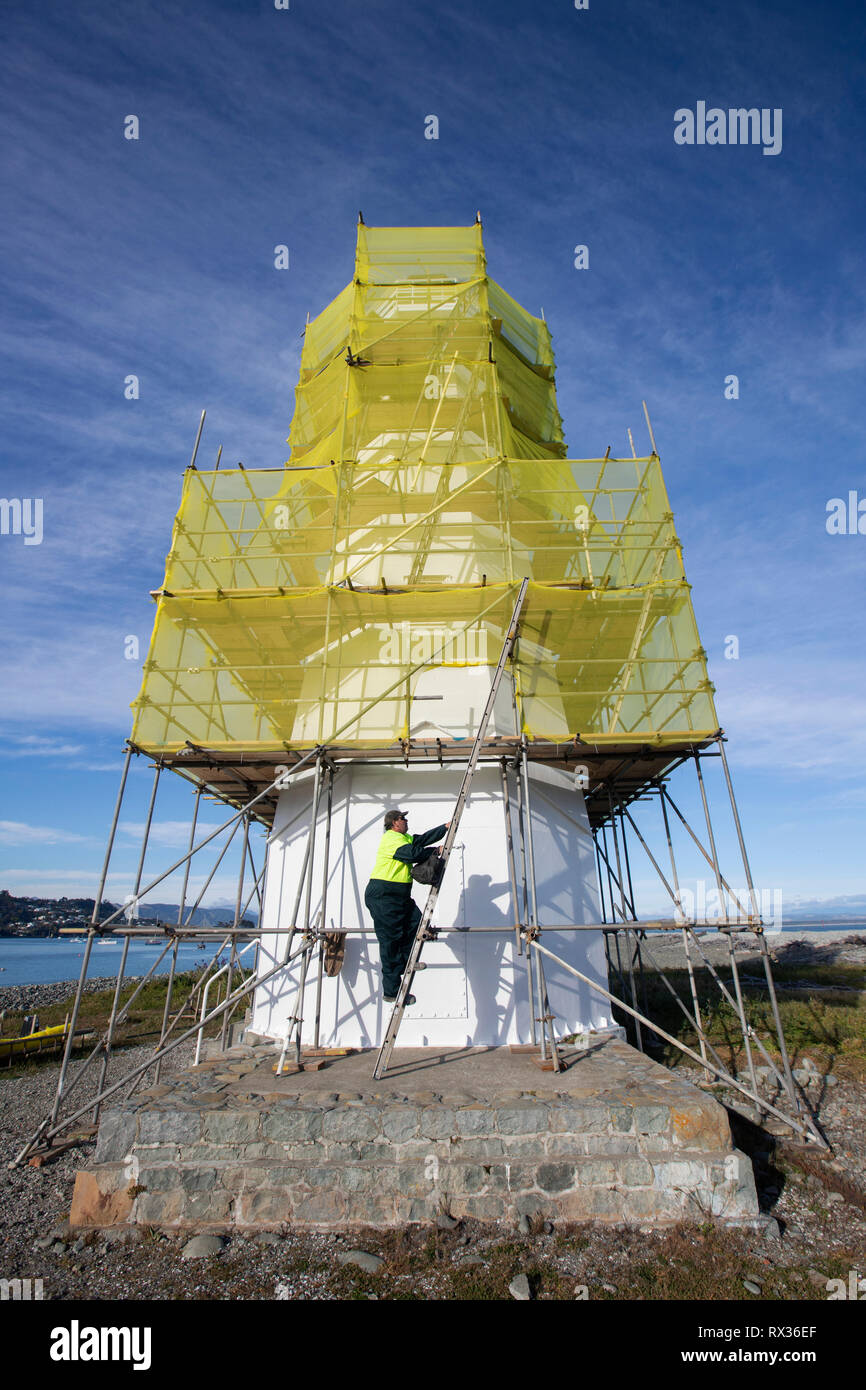 Painter Dwayne Robinson at Nelson lighthouse Stock Photo