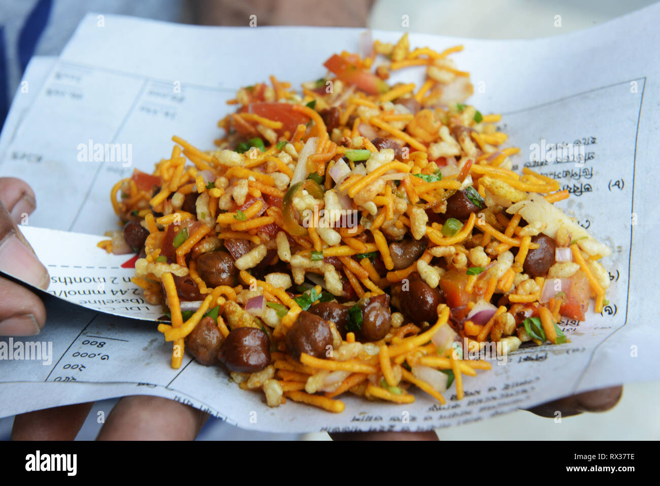 Chanachur Vaja is a popular street snack in Bangladesh. Stock Photo